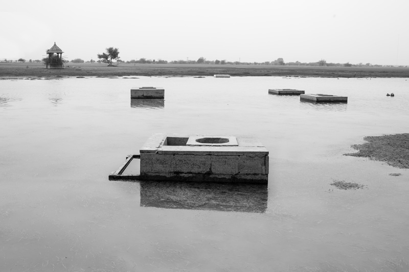 Nature-based Solutions for Drinking Water - rainfed pond having shallow wells inside, used for drinking water supply round the year in the arid Thar Desert in Jaisalmer district, Rajasthan